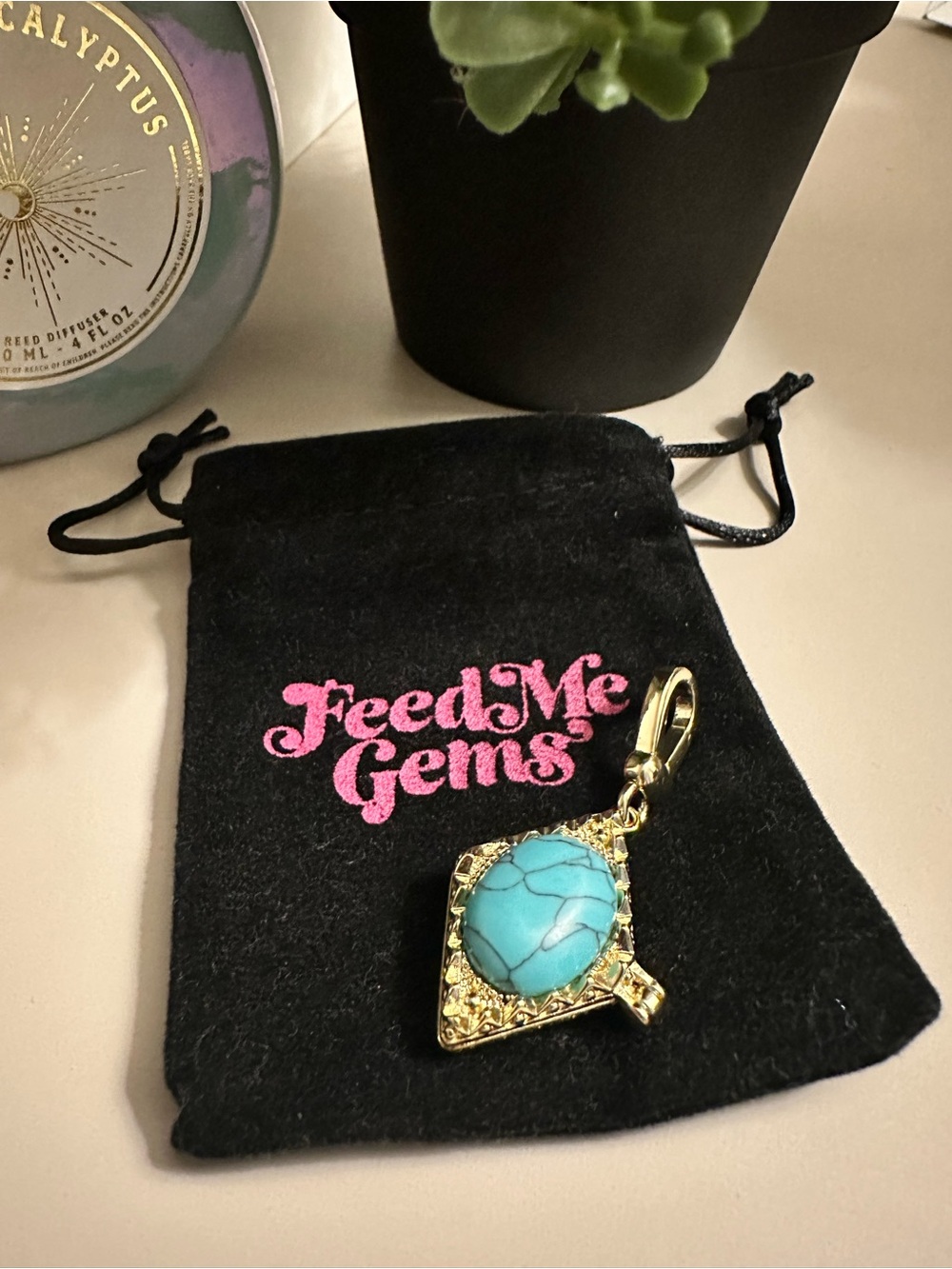 New Feed Me Gems  Turquoise Judas Charm